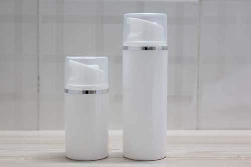 50ml white airless pump bottle with silver Line and clear cap ,50 ml airless Cosmetic Container with silver line